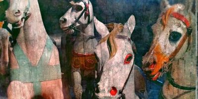 Un giro di giostra tra manifesti e giochi in mo...