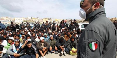 Sgominata organizzazione di stranieri che favor...